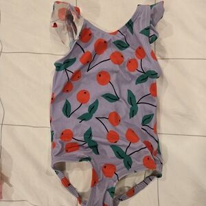 Hanna Andersson Purple One Piece with Red and Green Cherry Print